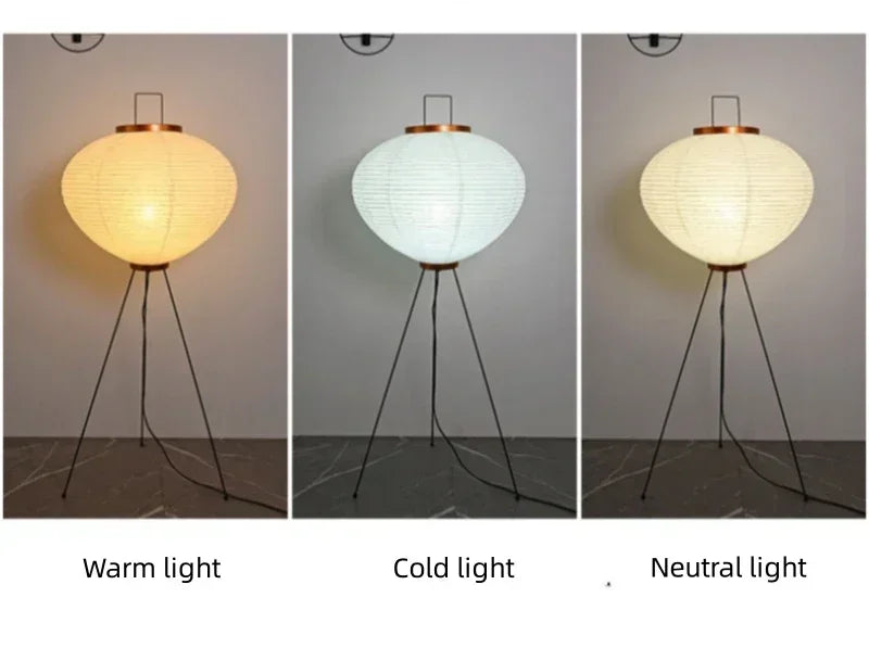 Tripod floor lamp with paper lantern shade showing warm, cold, and neutral light modes against gray wall