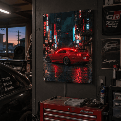 Red sports car night city acrylic wall art lit above garage tool chest