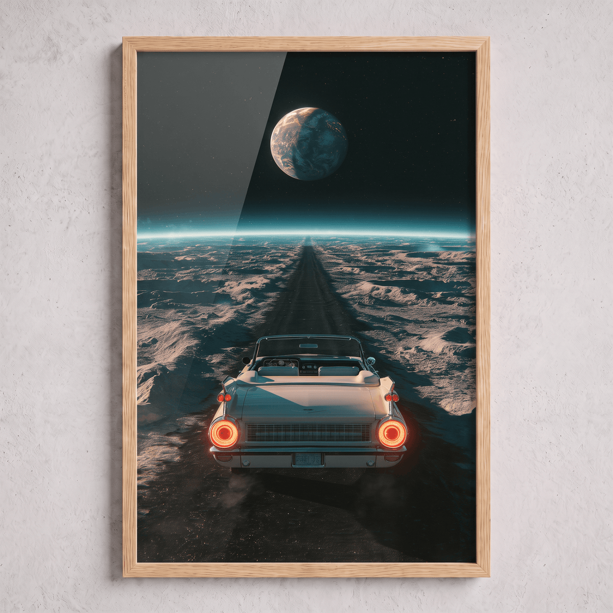 Vintage retro convertible driving down a desert road toward a glowing planet in space, framed in a natural oak wood canvas frame on a textured neutral wall.