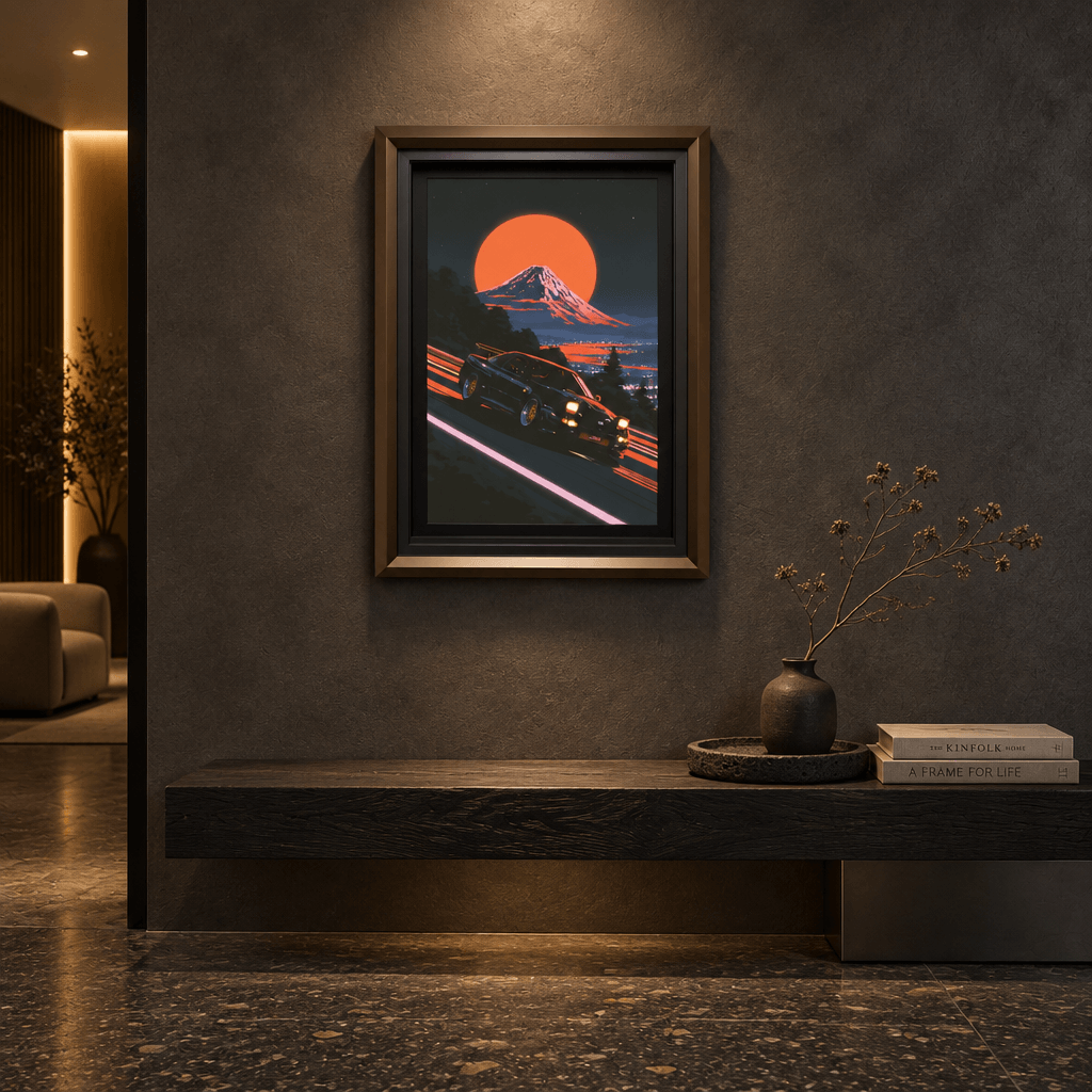 Framed canvas wall art featuring a retro drift car on a mountain pass under a glowing red sun, displayed in a stylish modern room with black floating frame.