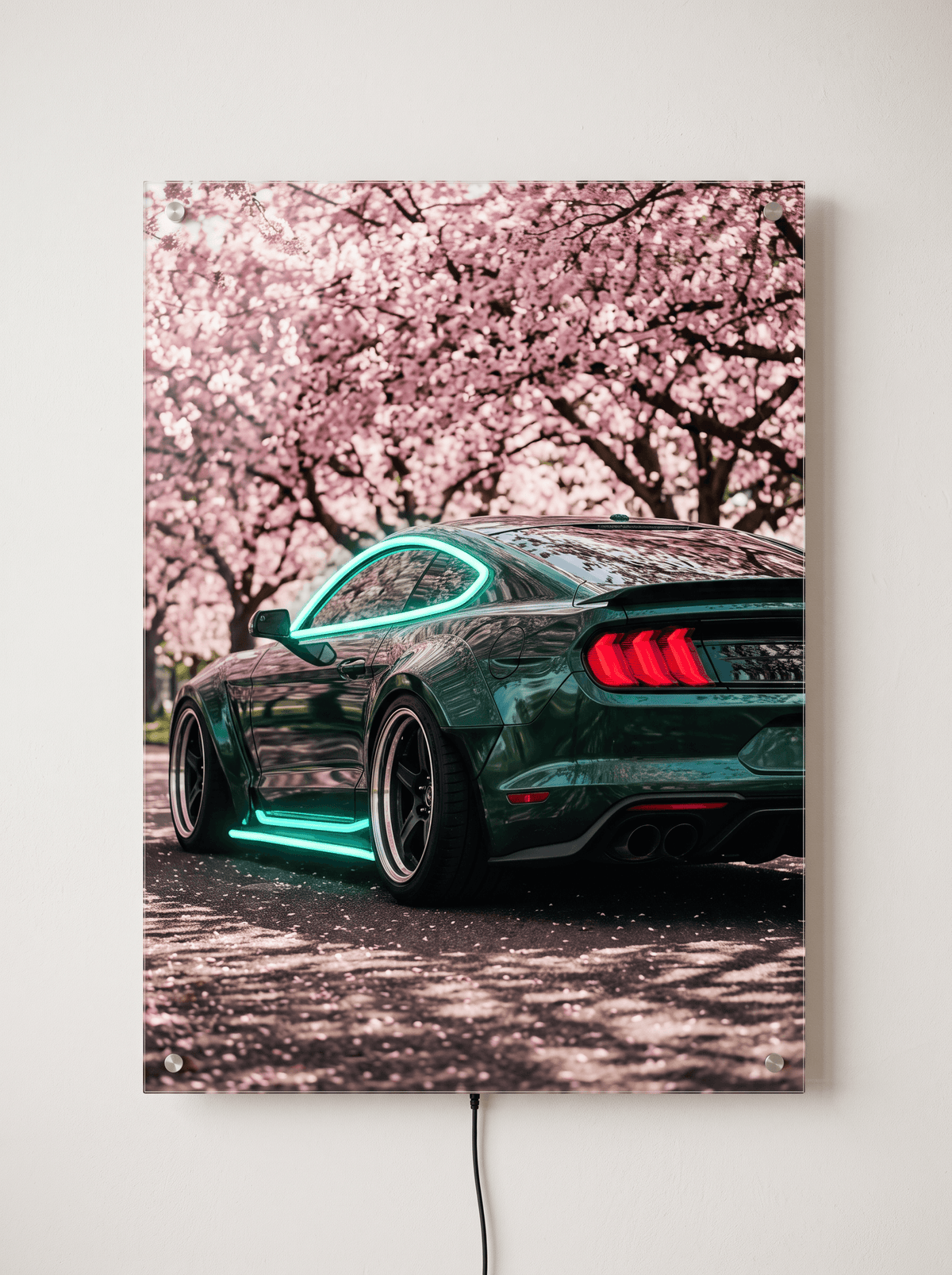Glowing LED neon acrylic wall art of a dark green muscle car parked under blooming cherry blossoms with vibrant cyan illuminated accents.