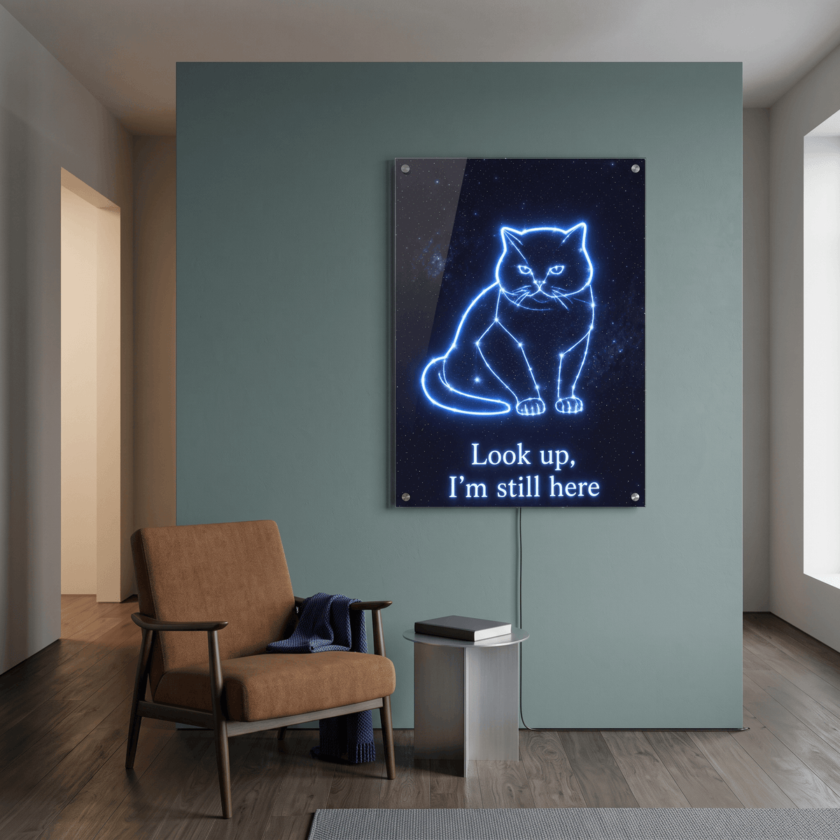 Custom pet memorial cat constellation glowing LED neon acrylic wall art sign hung in a stylish living room above a chair.