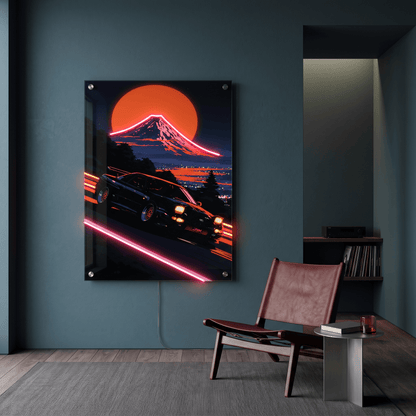Glowing Japanese sports car and Mount Fuji LED neon acrylic wall art displayed in a modern lounge room with leather armchair.