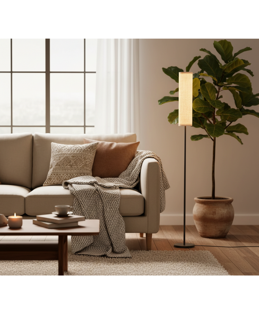Tall fabric floor lamp with rectangular shade beside a beige sofa in a cozy living room, adjustable 2800K–7000K.